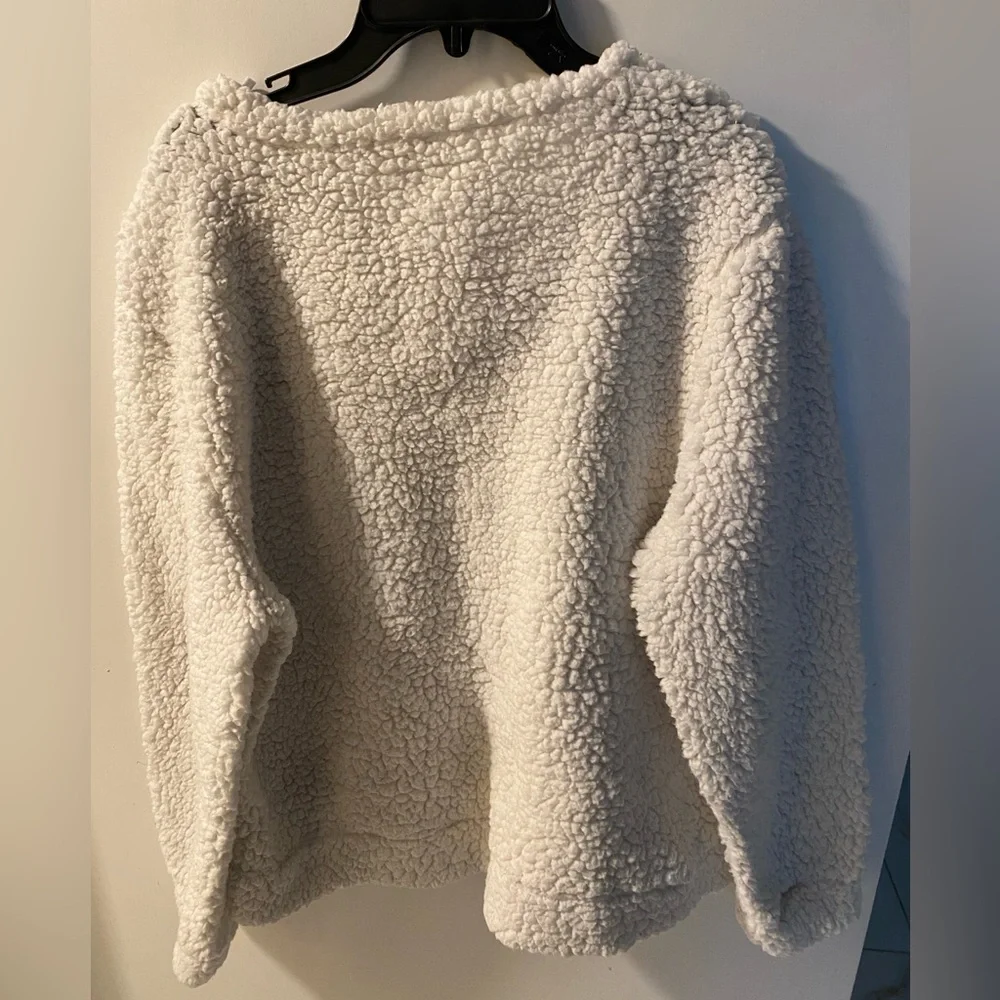 Chic Snowman V-Neck Sweater in Cream